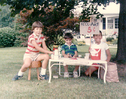 Eric Foster, Paul, and me in front of my old house.  I was 7